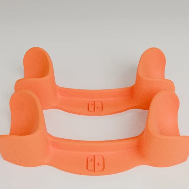 Dual Pro Controller Stand, 3D printed in Orange